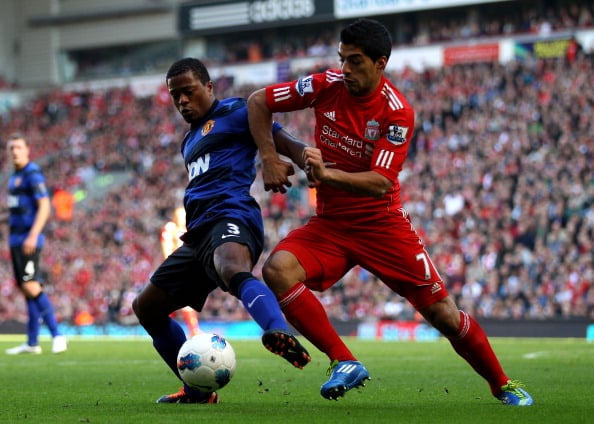 Patrice Evra og Luis Suarez