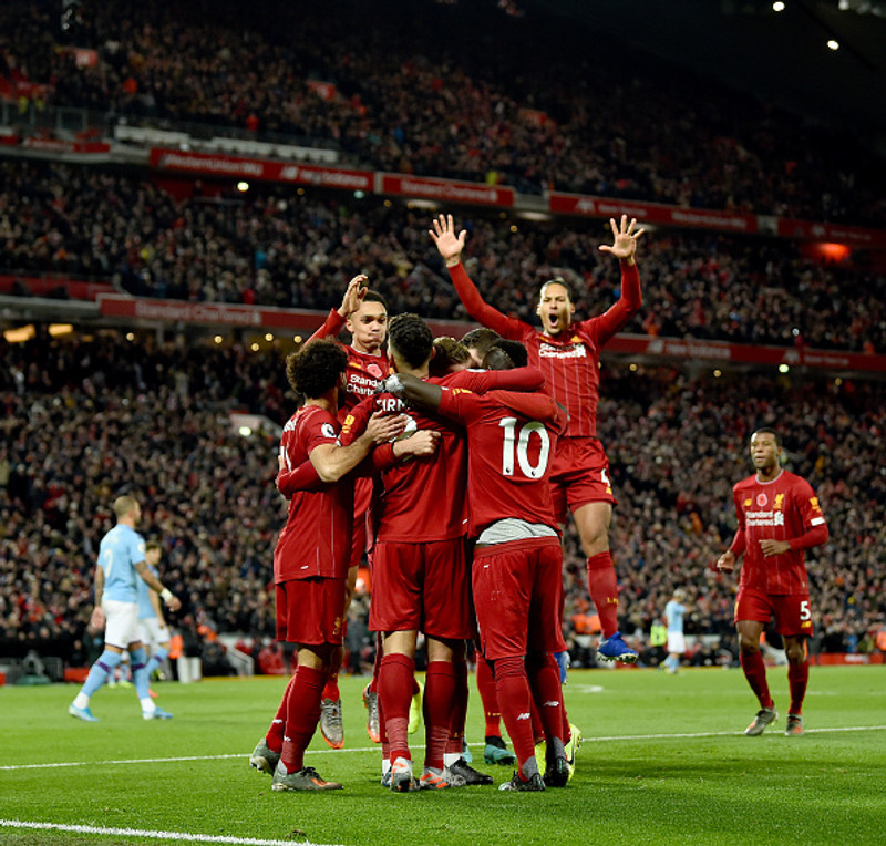 Liverpool er á toppnum með átta stiga forskot. Framundan er landsleikjahlé.