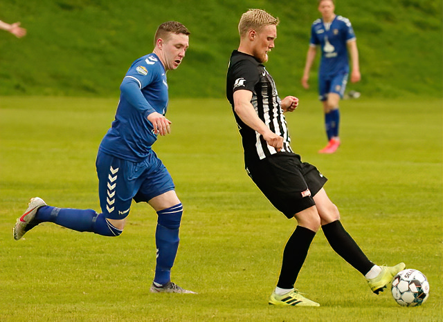 Úr leik KF og Magna á Ólafsfjarðarvelli fyrr í júní.