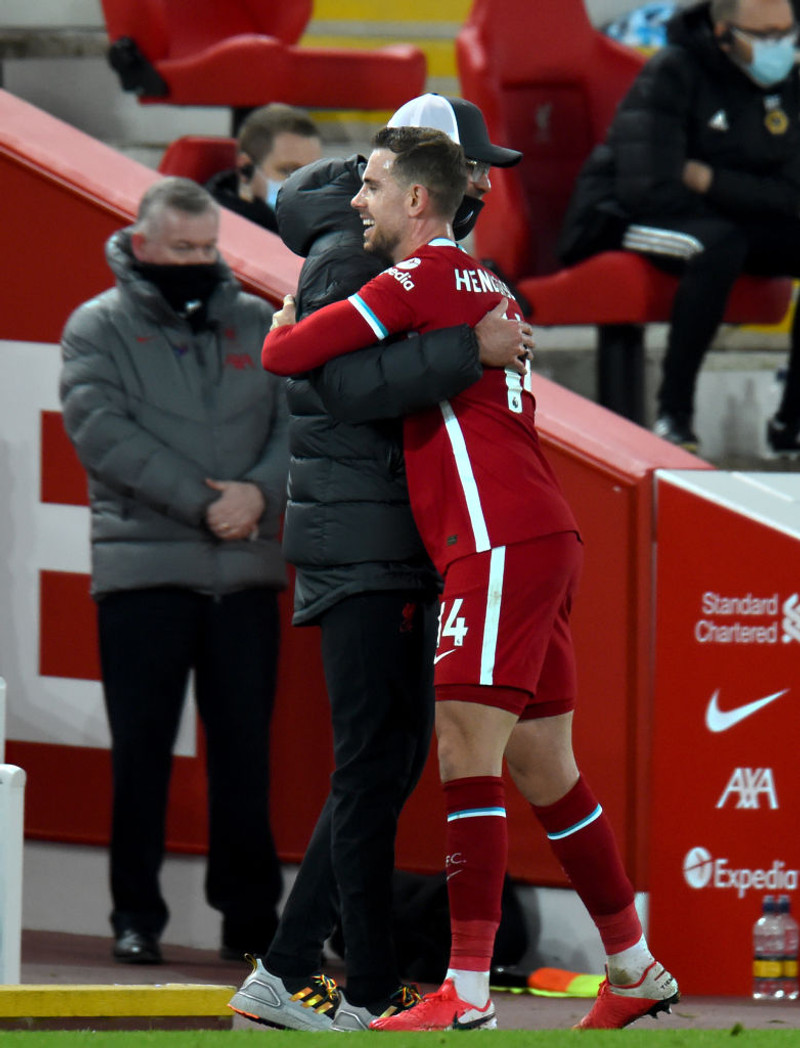 Jurgen Klopp og Jordan Henderson.