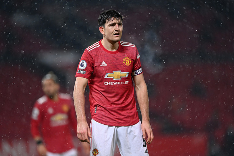 Harry Maguire féll í teignum.