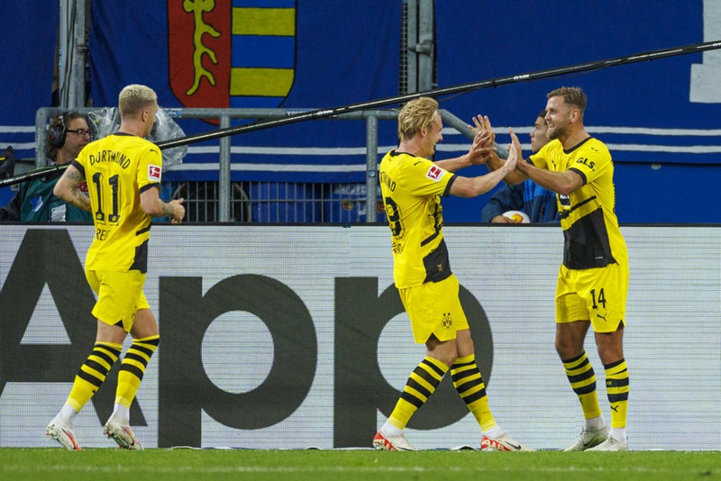 Þýskaland: Dortmund á toppinn eftir erfiðan slag