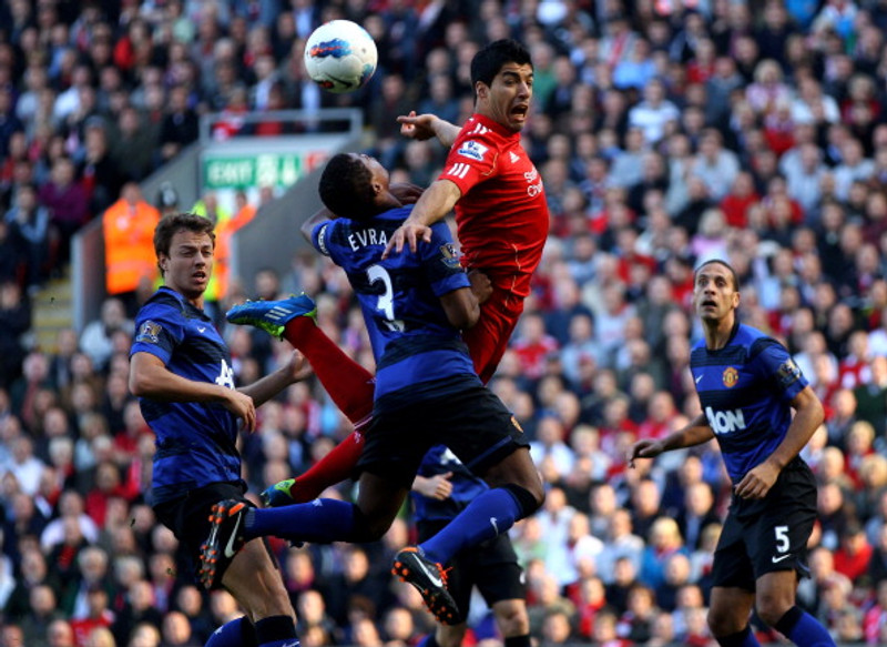 Patrice Evra og Luis Suarez