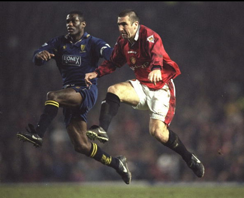 Eric Cantona er efstur á lista Neville.